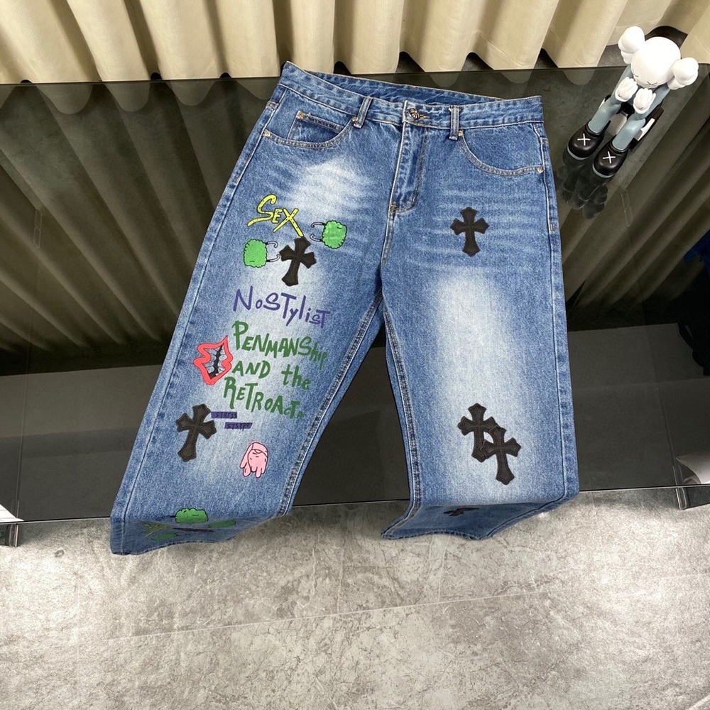 Chrome Hearts Distressed Blue Jeans with Black and Green Accents